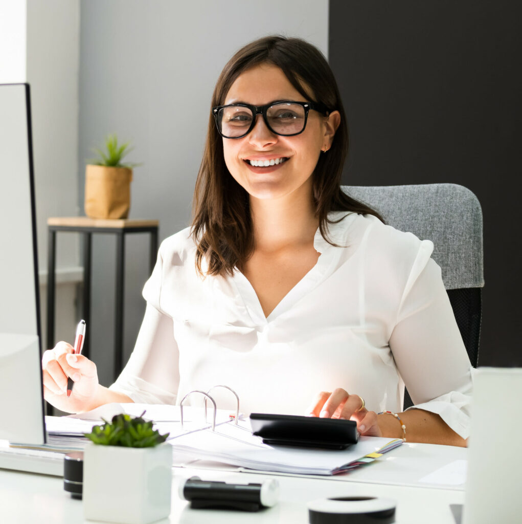 Accountant in a chair with calculator